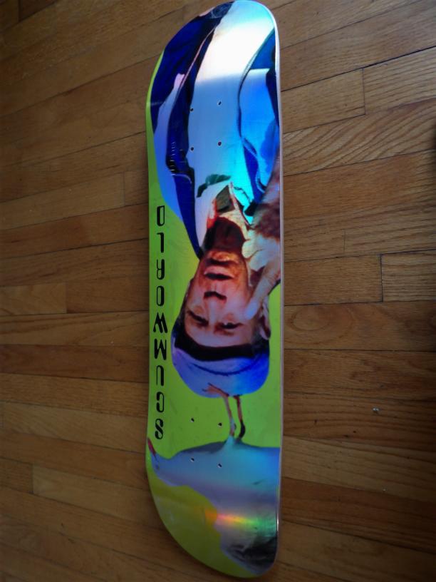 Middle finger bird skate deck.