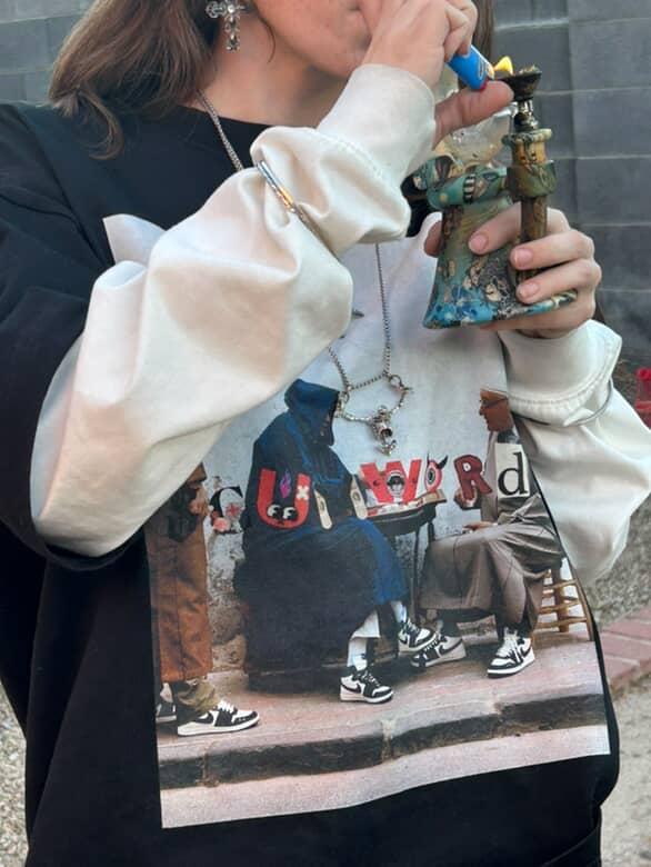 “Street Café Reflections Long Sleeve Tee.”