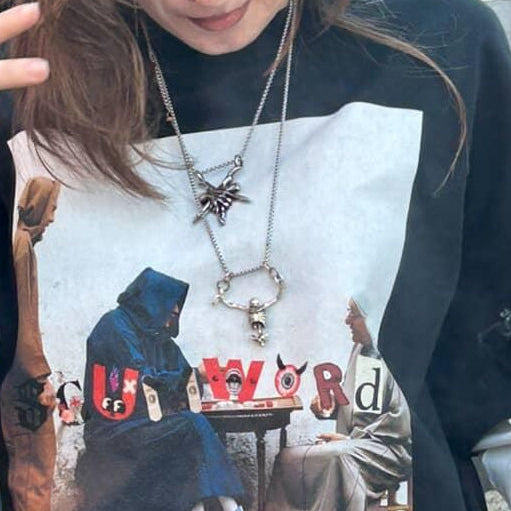 “Street Café Reflections Long Sleeve Tee.”